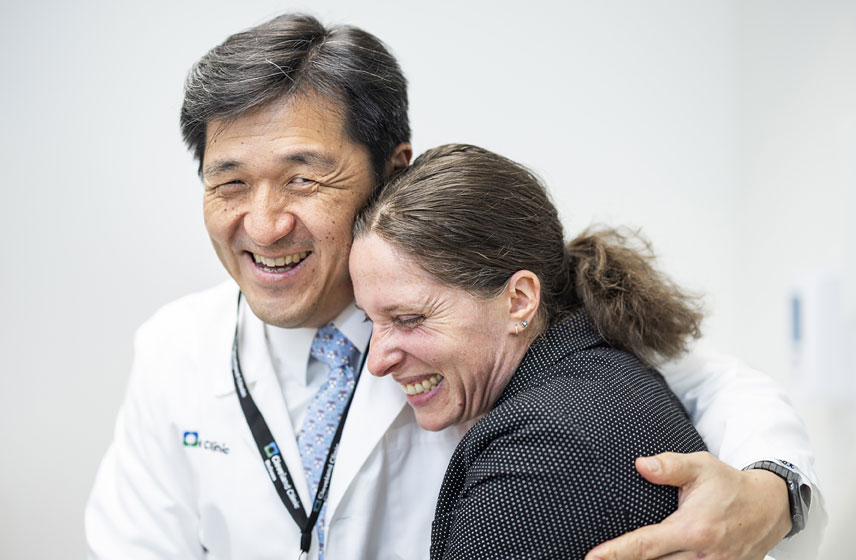 Two caregivers embracing